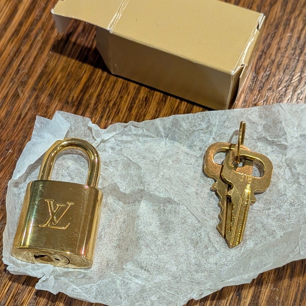 Brand New Louis Vuitton Lock With Two Keys And Box